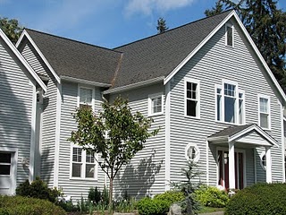 A charming colonial style home sitting atop Fort Ward Hill Road. Homes on this side of the street have a stunning, unobstructed view of Rich Passage.